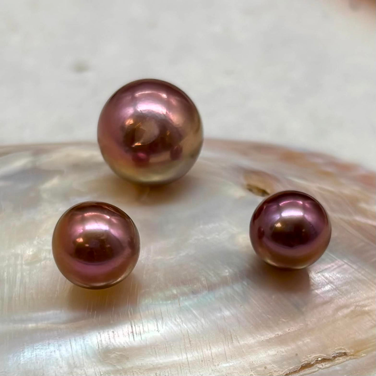 Rare Imperial Plum Pearl Trio — Mirror Luster