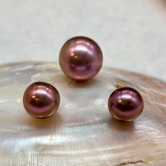 Rare Imperial Plum Pearl Trio — Mirror Luster
